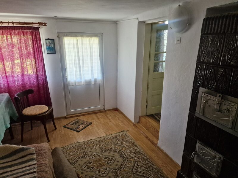 Casa in mediu rural cu teren